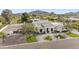 Luxury estate showcasing impeccable landscaping and curb appeal, complete with a circular driveway at 6129 E Turquoise Ave, Paradise Valley, AZ 85253