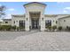 Stately home features beautiful exterior architecture, professional landscaping, and modern entrance at 6129 E Turquoise Ave, Paradise Valley, AZ 85253