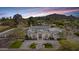 Stunning home featuring meticulous landscaping, lush greenery and a circular driveway for a grand arrival at 6129 E Turquoise Ave, Paradise Valley, AZ 85253