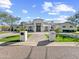 Elegant home boasts pristine landscaping, a beautiful walkway, and great curb appeal at 6129 E Turquoise Ave, Paradise Valley, AZ 85253