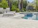 Backyard pool and patio area featuring lounge chairs and a relaxing spa at 6129 E Turquoise Ave, Paradise Valley, AZ 85253