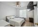Bright bedroom with a ceiling fan, neutral walls, and ample natural light for a calm and inviting atmosphere at 7329 W Lamar Rd, Glendale, AZ 85303
