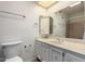 Bathroom with a bright vanity and a shower/bathtub combo in the background for easy access at 7843 E Valley View Rd, Scottsdale, AZ 85250