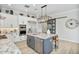 Charming kitchen features granite countertops, a central island, and stainless steel appliances at 8154 E Jaeger St, Mesa, AZ 85207