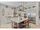 Modern kitchen boasts granite countertops, stainless steel appliances and a stylish island at 8154 E Jaeger St, Mesa, AZ 85207