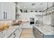 Well-appointed kitchen boasts sleek appliances, granite countertops, and ample cabinet space at 8154 E Jaeger St, Mesa, AZ 85207