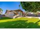Sprawling backyard with lush artificial turf, perfect for relaxation and entertainment at 8656 E Plaza Ave, Scottsdale, AZ 85250