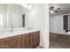 Bathroom features a double vanity with white countertops at 9431 E Coralbell Ave # 178, Mesa, AZ 85208