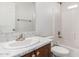 Bathroom features white marble-look countertops and a shower-tub combo at 9431 E Coralbell Ave # 178, Mesa, AZ 85208