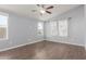 Bright bedroom featuring wood floors and natural light from windows at 9431 E Coralbell Ave # 178, Mesa, AZ 85208