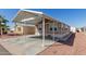 Single-level home featuring a spacious carport, complemented by desert landscaping at 9431 E Coralbell Ave # 178, Mesa, AZ 85208