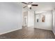 Spacious living room features wood floors and a ceiling fan at 9431 E Coralbell Ave # 178, Mesa, AZ 85208