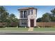 Charming two-story home with a stucco facade, arched balconies, and professionally landscaped front yard at 9839 W Catalina Dr, Phoenix, AZ 85037