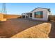 Large backyard showing potential for various outdoor activities or landscaping projects at 21277 N 272Nd Ave, Buckeye, AZ 85396