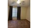 Comfortable bedroom with neutral carpet and a large window for ample light at 4601 N 102Nd Ave # 1100, Phoenix, AZ 85037
