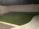Night view of backyard featuring pristine artificial grass at 127 E Pershing Ave, Phoenix, AZ 85022