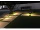 Ambient outdoor space features stepping stones and artificial turf at 127 E Pershing Ave, Phoenix, AZ 85022