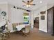 Bright dining area features a table with seating for four and a sliding glass door to the backyard at 1347 W Straford Ave, Gilbert, AZ 85233
