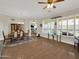 Open-concept dining room with a chandelier at 1347 W Straford Ave, Gilbert, AZ 85233