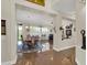 Open-concept dining room with a chandelier and hardwood floors at 1347 W Straford Ave, Gilbert, AZ 85233