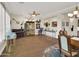 Spacious dining room with hardwood floors, elegant decor, and ample natural light at 1347 W Straford Ave, Gilbert, AZ 85233