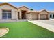 Charming single-Gathering home with a two-car garage and well-manicured lawn at 1347 W Straford Ave, Gilbert, AZ 85233