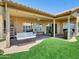 Covered patio overlooking a well-manicured lawn at 1347 W Straford Ave, Gilbert, AZ 85233