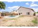 Backyard view with a pool, seating area and plenty of space for entertaining at 1520 E Flint St, Chandler, AZ 85225
