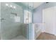 Tiled glass-enclosed shower showcasing tile work with built-in niche and bench seating at 1520 E Flint St, Chandler, AZ 85225