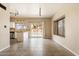 Open floor plan with tile flooring in dining area with views of the backyard pool at 1520 E Flint St, Chandler, AZ 85225