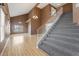 View of foyer, stairs and living room with lots of natural light and high ceilings at 1520 E Flint St, Chandler, AZ 85225