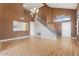 Open floor plan with stairs leading up to the bedrooms and a tall vaulted ceiling at 1520 E Flint St, Chandler, AZ 85225