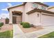 Inviting front entrance featuring a covered porch, well-kept landscaping, and a classic-style front door at 1520 E Flint St, Chandler, AZ 85225