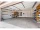 Spacious garage featuring ample room for parking and storage, with shelving and a clean, organized layout at 1520 E Flint St, Chandler, AZ 85225