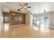 Spacious living room with wood floors and an open concept to the kitchen at 1520 E Flint St, Chandler, AZ 85225