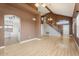 Open floor plan with the living room, staircase, and hallway with tiled floor at 1520 E Flint St, Chandler, AZ 85225