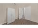 Bedroom with wood-style flooring and a closet for storage at 3109 N Meadow Dr, Avondale, AZ 85392