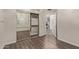 Bedroom showcasing mirrored closet doors and view to the living area beyond at 3109 N Meadow Dr, Avondale, AZ 85392