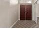 Entryway featuring a double door and wood-look floors, leading into the home at 3109 N Meadow Dr, Avondale, AZ 85392