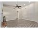 Bright, open living space featuring hardwood floors, high ceilings, and ample natural light at 3109 N Meadow Dr, Avondale, AZ 85392