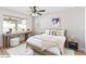 Cozy bedroom with desk, natural light, and modern furnishings, perfect for relaxation or study at 4534 E Beverly Ln, Phoenix, AZ 85032