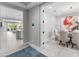 Inviting foyer with an open floor plan connecting to dining, living, and kitchen areas at 5962 E Abraham Ln, Phoenix, AZ 85054