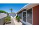 The backyard features a sunroom, storage shed, and a fenced yard with desert landscaping at 6258 E Duncan St, Mesa, AZ 85205