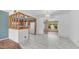 Open concept dining room featuring tile floors, and a view of the kitchen at 6258 E Duncan St, Mesa, AZ 85205