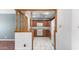 Cozy kitchen with wood cabinets, white appliances, and granite countertops at 6258 E Duncan St, Mesa, AZ 85205