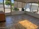 Enclosed patio, offering ample natural light and views of the well-maintained backyard at 6258 E Duncan St, Mesa, AZ 85205