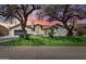 Charming single story home with a beautiful front lawn and mature trees at 7624 E Larkspur Dr, Scottsdale, AZ 85260