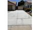 Long concrete driveway leads to a gated entrance at , Gilbert, AZ 85233