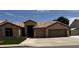 Charming one-story home with tile roof, desert landscaping, and a two car garage at , Gilbert, AZ 85233