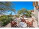 Backyard featuring desert landscaping, patio furniture and partial shade at 11099 E Desert Vista Dr, Scottsdale, AZ 85255
